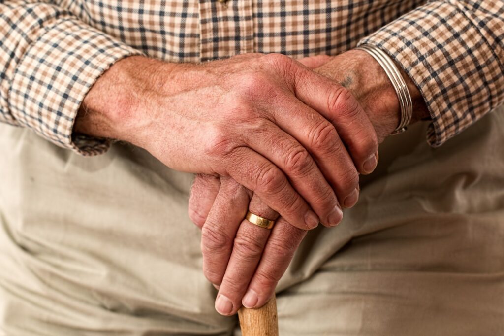 Image of elderly man's hands | Angela Griffith Law