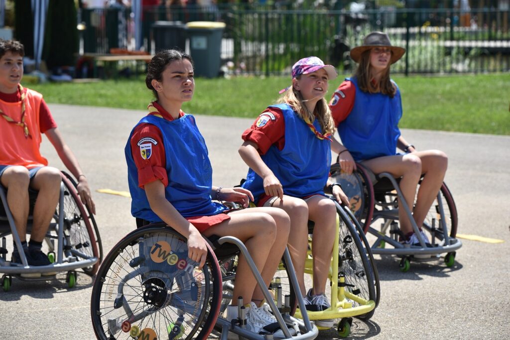 Image of children in wheelchair about to start a race | Angela Griffith Law